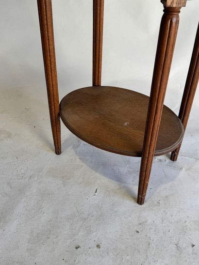 Wooden oval pedestal table, tapered and fluted...
