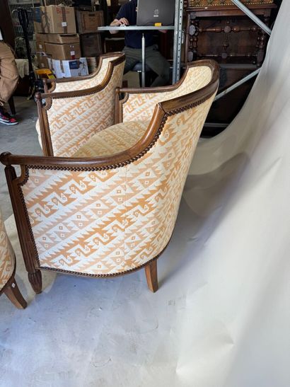A living room set made of molded wood, with...