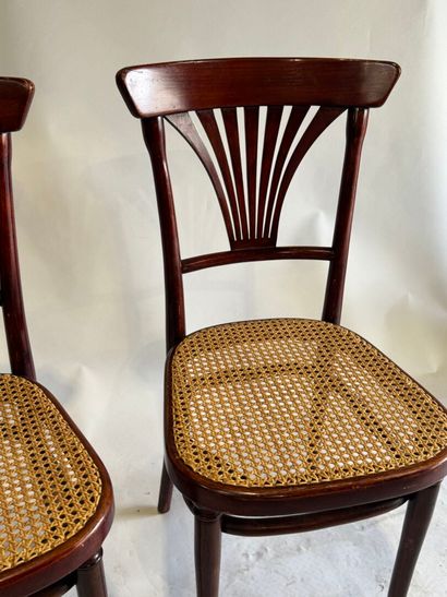 THONET.
Stained wooden bistro chairs with...