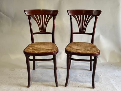 THONET.
Stained wooden bistro chairs with...