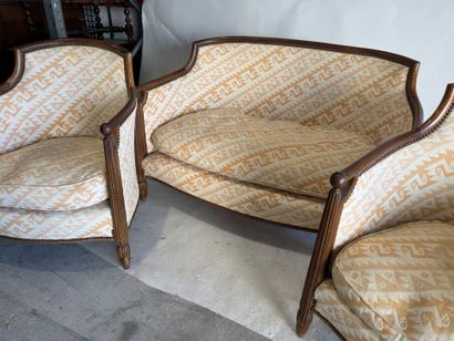 A living room set made of molded wood, with...