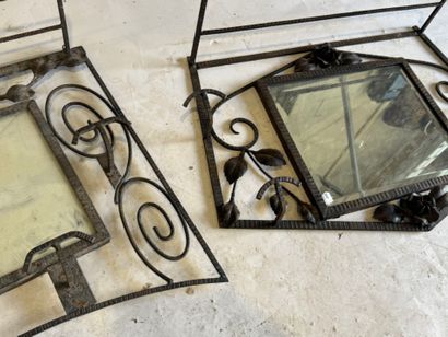 Two entryway coat racks made of openwork...