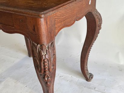 Stepped oak desk with four drawers and a...