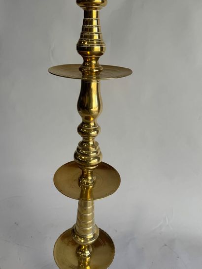 Gold-plated brass candlestick mounted as...