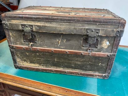 Coated wood, leather and brass travel trunk,...