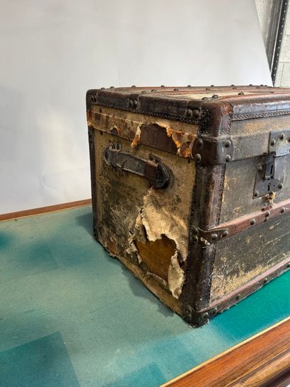 Coated wood, leather and brass travel trunk,...