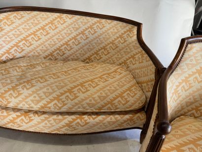 A living room set made of molded wood, with...