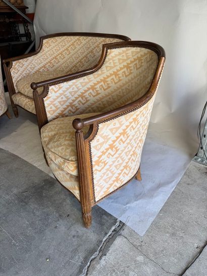 A living room set made of molded wood, with...