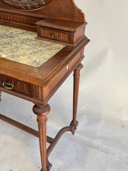 Walnut dressing table with an oval mirror,...