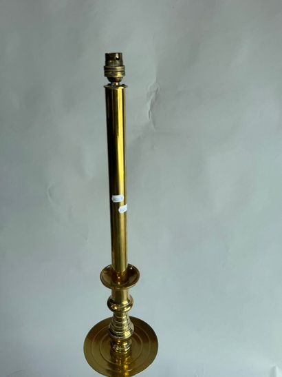 Gold-plated brass candlestick mounted as...