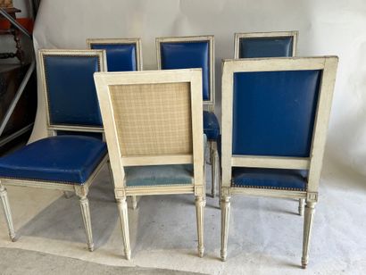 Set of six white-lacquered, molded-wood chairs...