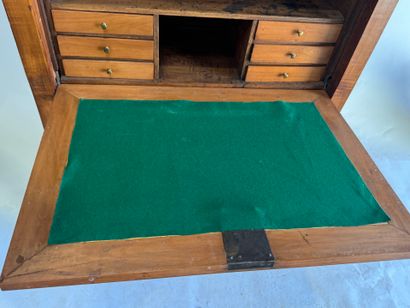 Walnut drop-leaf desk with a veined gray...