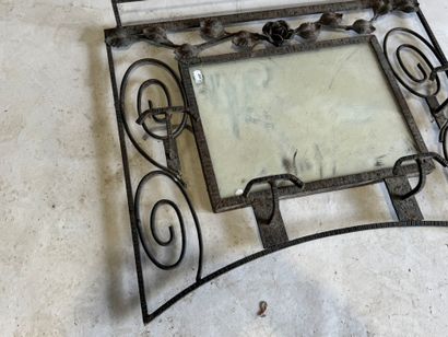 Two entryway coat racks made of openwork...