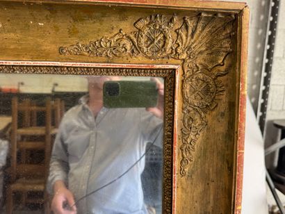 Large wooden mirror with stuccoed and gilded...