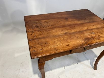 Natural wood writing table opening with a...