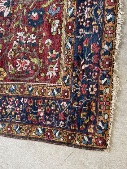 Small hand-knotted woollen rug with polychrome...