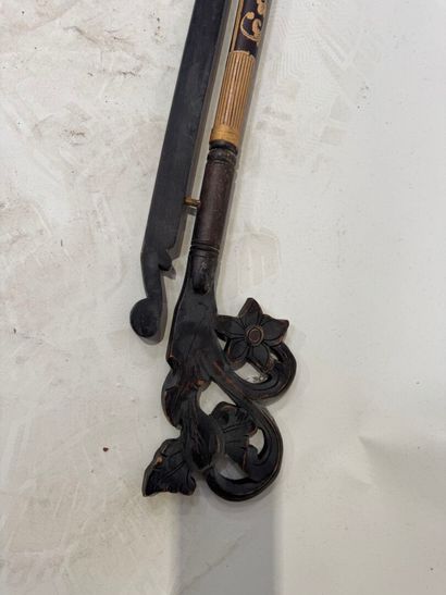 ASIA, 20th century.
Exotic wood curtain rod...