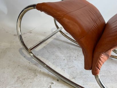 Rocking chair in skai, the base in tubular...
