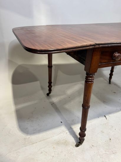 Drop-leaf table in natural wood, on castor...