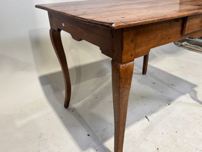 Natural wood writing table opening with a...
