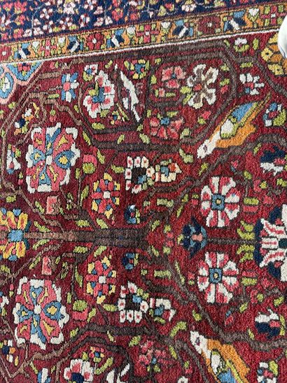 Small hand-knotted woollen rug with polychrome...