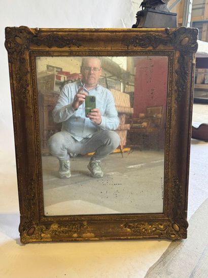 Rectangular mirror in wood and gilded stucco...