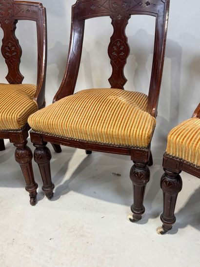 Set of three chairs in carved molded wood,...