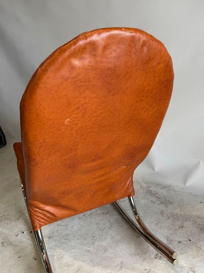 Rocking chair in skai, the base in tubular...