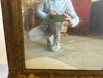 Rectangular mirror in wood and gilded stucco...