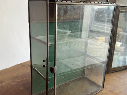 Set comprising:
- a brass and glass display...