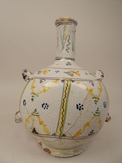 NEVERS, XIXe.
Gourde en faïence polychrome...