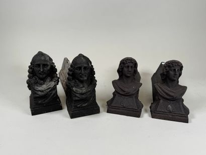 Deux paires de chenets en fonte à décor de...