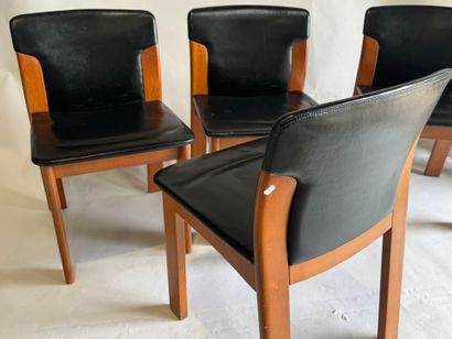 Set of four chairs in stained wood and black...