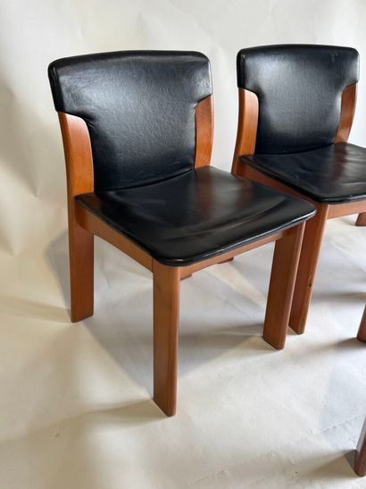 Set of four chairs in stained wood and black...