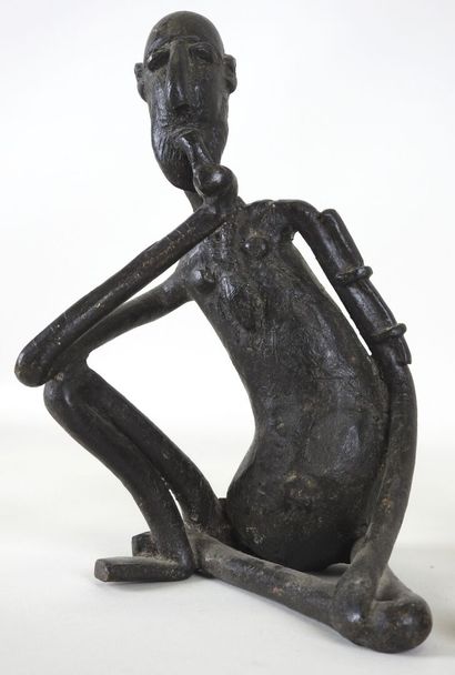 AFRIQUE, XXe.
Femme allaitant et homme fumant...