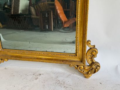 Rectangular wood and gilded stucco mirror...