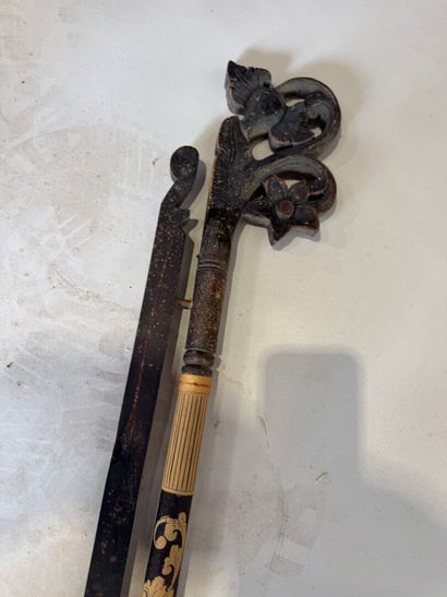 ASIA, 20th century.
Exotic wood curtain rod...