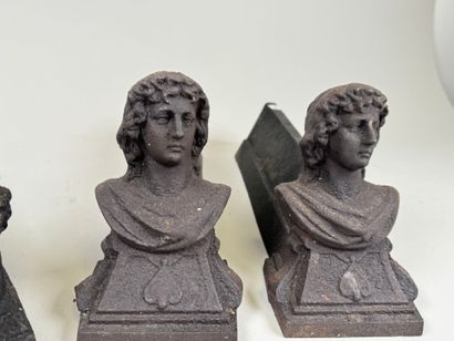 Deux paires de chenets en fonte à décor de...