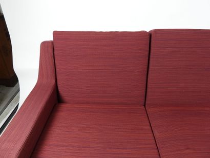 ROCHE BOBOIS.
Three-seater sofa in garnet...