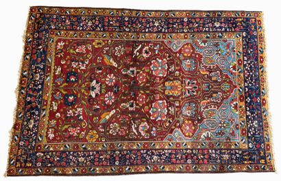 Small hand-knotted woollen rug with polychrome...