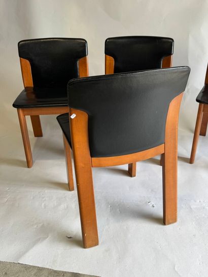 Set of four chairs in stained wood and black...