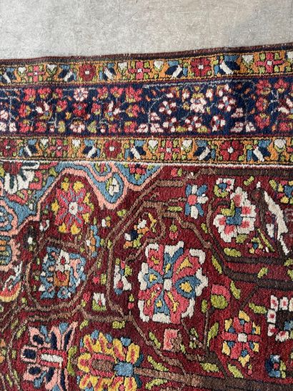 Small hand-knotted woollen rug with polychrome...