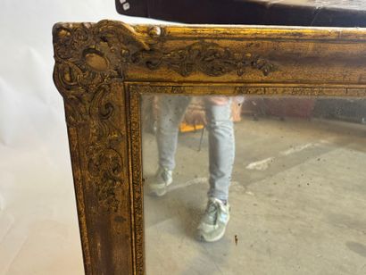Rectangular mirror in wood and gilded stucco...