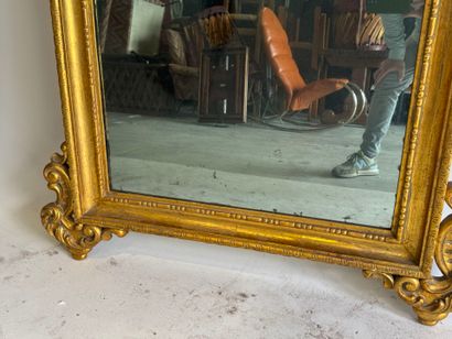 Rectangular wood and gilded stucco mirror...