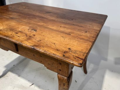 Natural wood writing table opening with a...