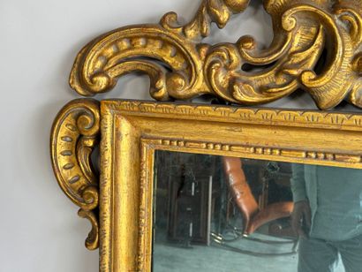 Rectangular wood and gilded stucco mirror...