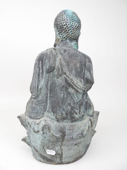 CHINE, XXe.
Bouddha assis sur un lotus. 
Sujet...