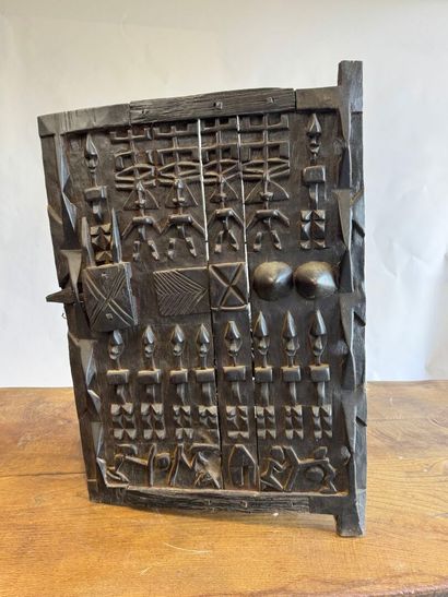 AFRICA, 20th century.
Carved wood door panel...