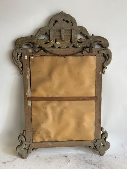 Rectangular wood and gilded stucco mirror...