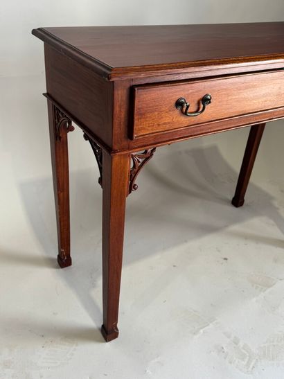 Console en bois teinté mouluré, ouvrant par...